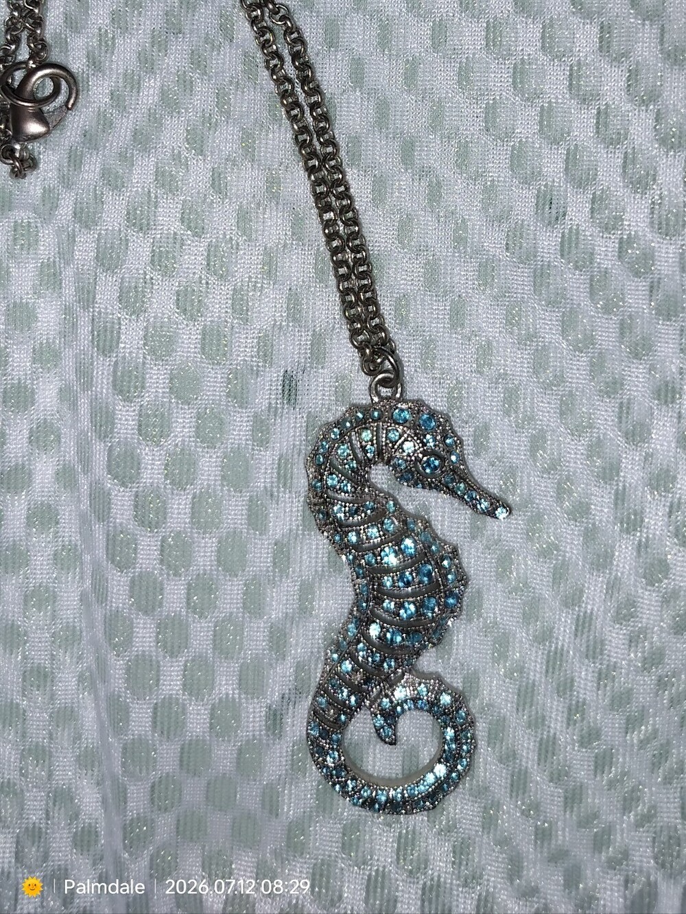 Silver Seahorse Pendant Necklace with Light Blue Crystals